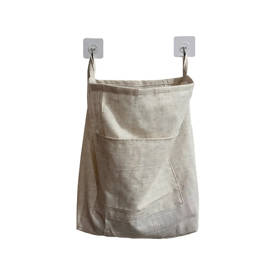 Panier à linge suspendu en tissu beige avec fermeture éclair