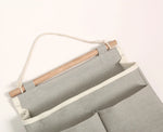 Panier suspendu en tissu gris ou blanc multi-poches - Vignette | Au comptoir des paniers