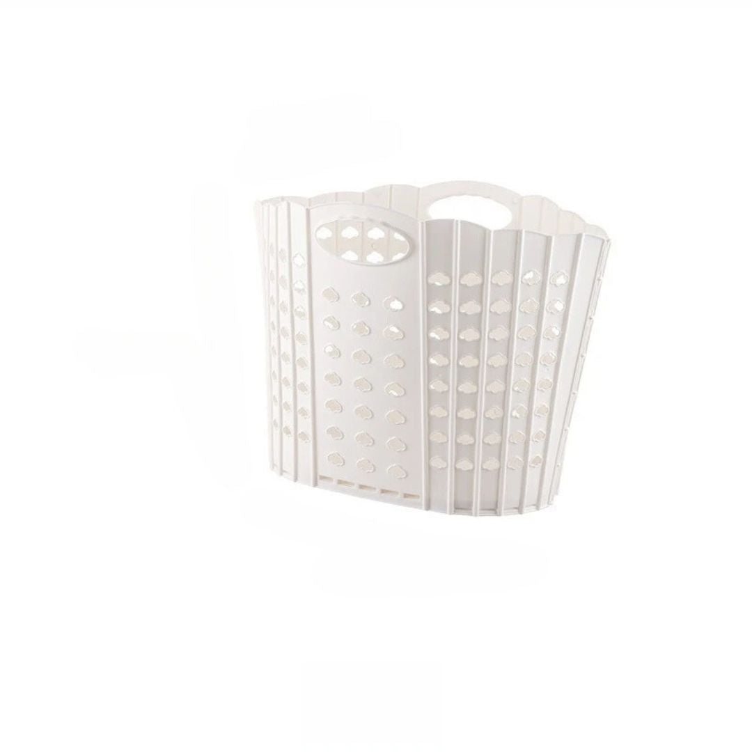 Panier à linge plastique pliable et portable sur fond blanc